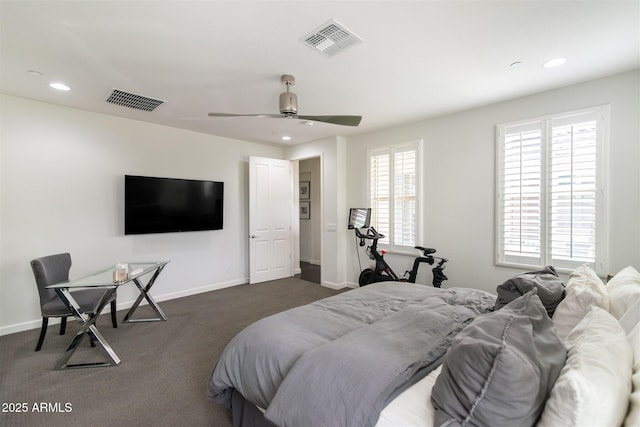 bedroom with visible vents, dark carpet, and recessed lighting