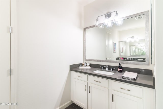 bathroom featuring vanity and visible vents