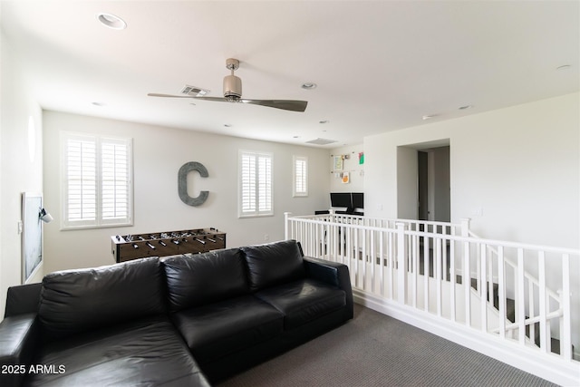 carpeted living room featuring recessed lighting, visible vents, and a ceiling fan