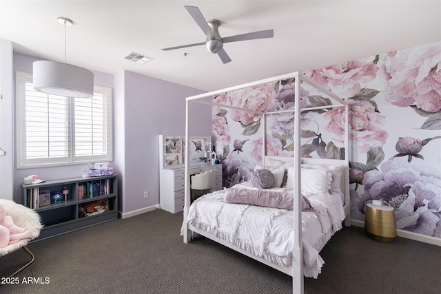 bedroom featuring baseboards, visible vents, carpet floors, and ceiling fan