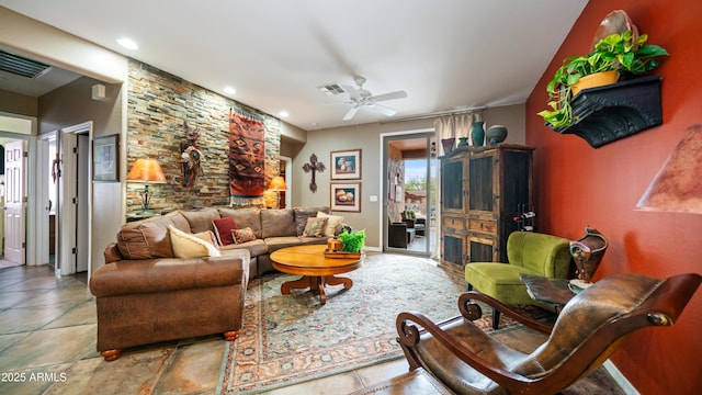 living area with visible vents, a ceiling fan, and recessed lighting