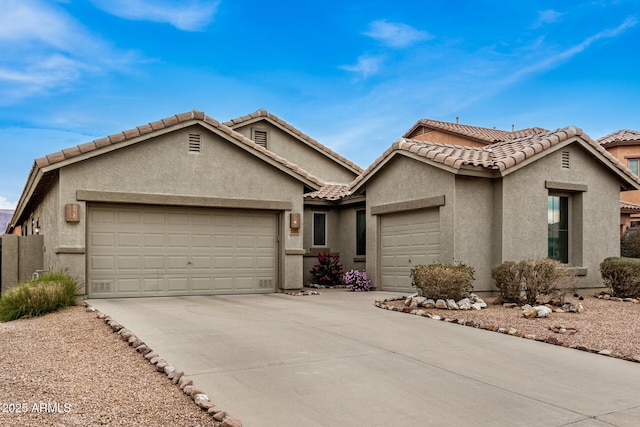 view of front of property with a garage