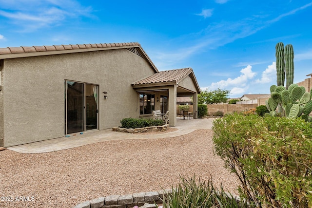 back of house featuring a patio area