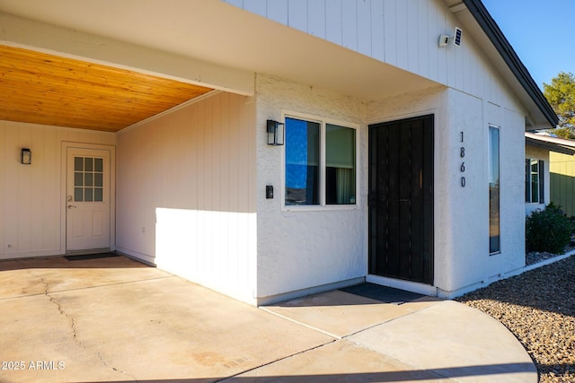 doorway to property featuring a patio area