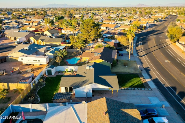 drone / aerial view featuring a mountain view