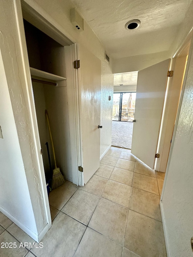 3340 W State Route 89a Unit 9, Sedona, AZ 86336 - hall with tile patterned floors
