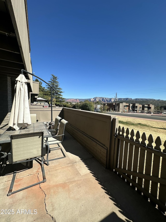 3340 W State Route 89a Unit 9, Sedona, AZ 86336 - view of patio with outdoor dining space and a mountain view