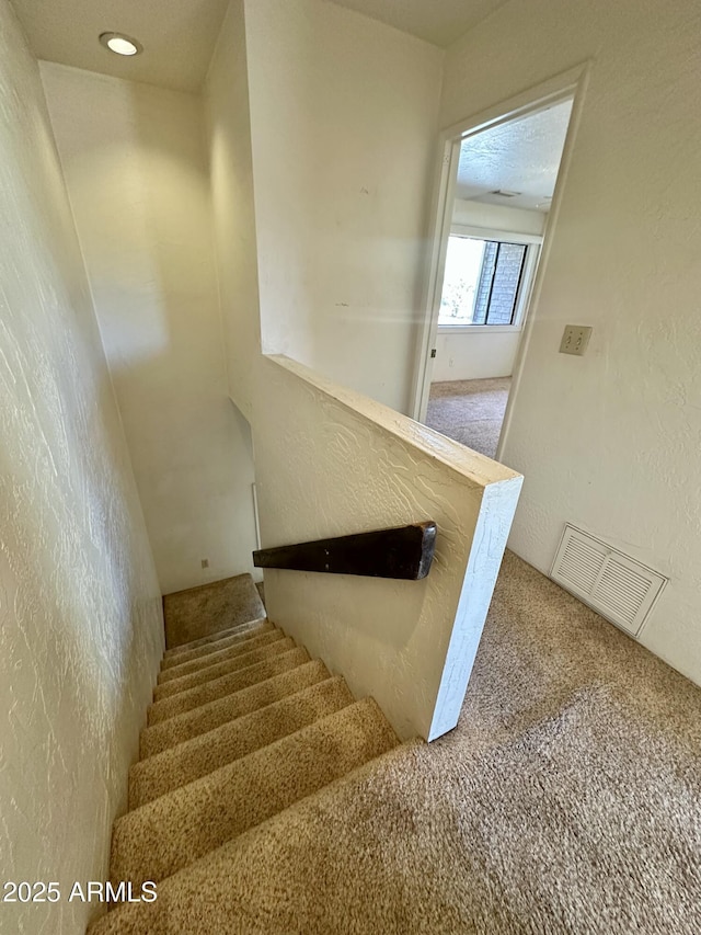 3340 W State Route 89a Unit 9, Sedona, AZ 86336 - stairs with carpet flooring and a textured wall