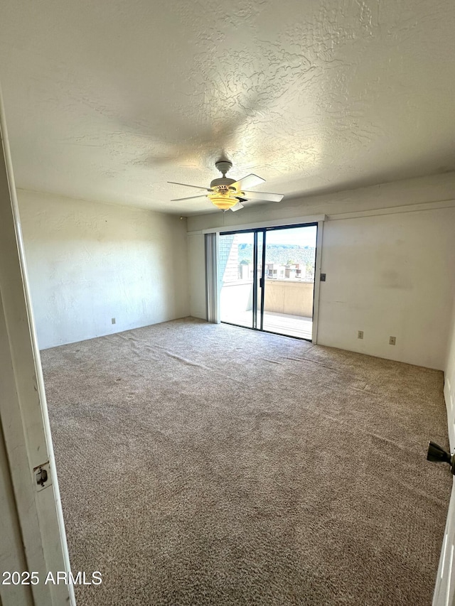 3340 W State Route 89a Unit 9, Sedona, AZ 86336 - empty room with carpet, a textured ceiling, and a ceiling fan