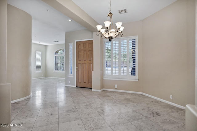 13945 E Gail Rd, Scottsdale, AZ 85259 - unfurnished dining area featuring a chandelier and light tile patterned floors