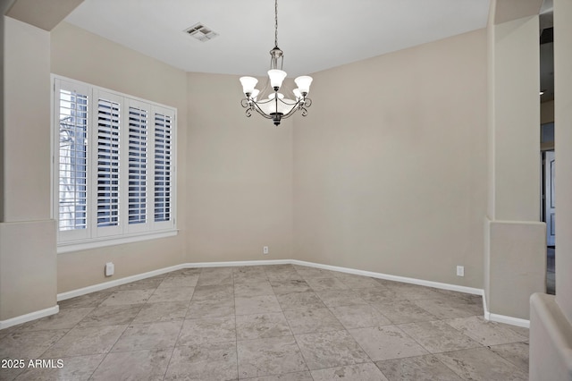 13945 E Gail Rd, Scottsdale, AZ 85259 - unfurnished room featuring a chandelier and baseboards