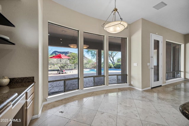 13945 E Gail Rd, Scottsdale, AZ 85259 - unfurnished dining area featuring light tile patterned floors
