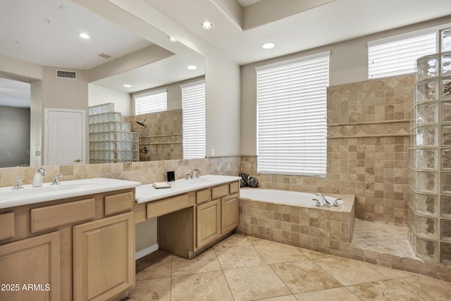 13945 E Gail Rd, Scottsdale, AZ 85259 - bathroom with double vanity, a bath, walk in shower, and recessed lighting