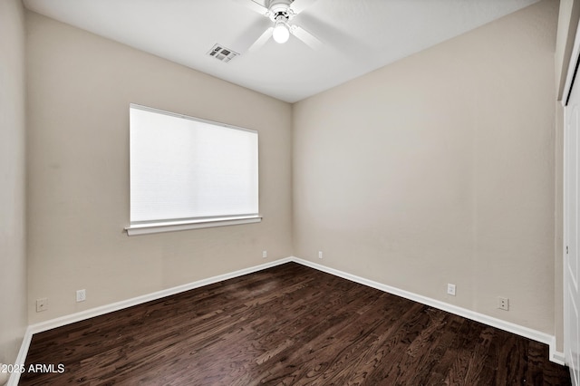 13945 E Gail Rd, Scottsdale, AZ 85259 - empty room with dark wood-style flooring and ceiling fan