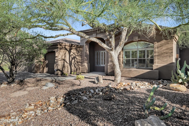 13945 E Gail Rd, Scottsdale, AZ 85259 - view of front of home featuring stucco siding