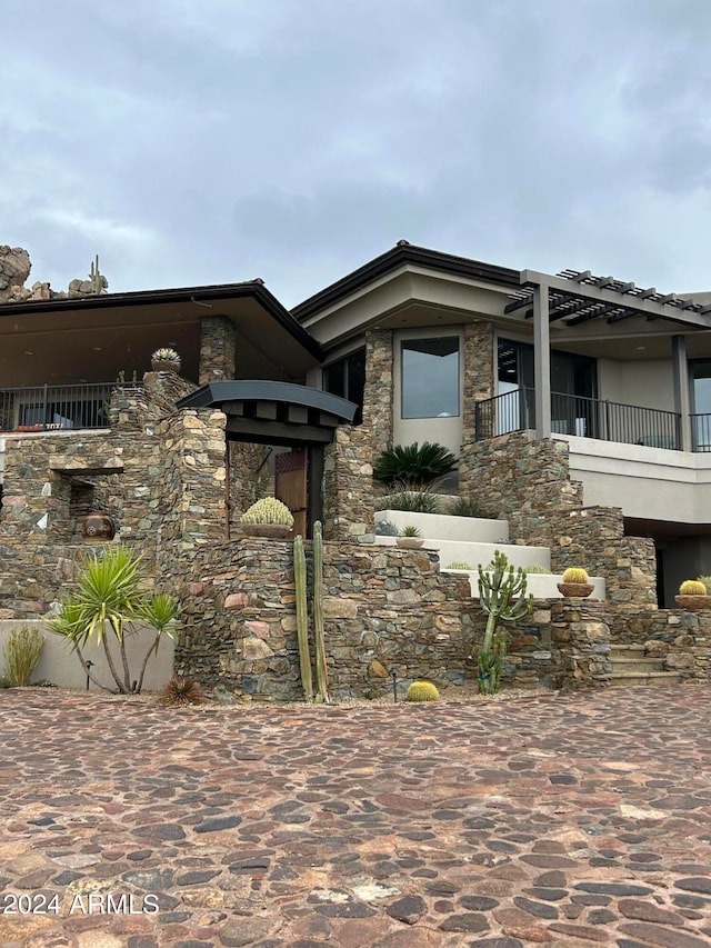 11070 E Rolling Rock Dr, Scottsdale, AZ 85262 - view of front of house featuring stone siding and stucco siding
