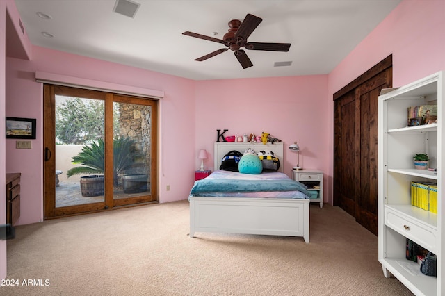11070 E Rolling Rock Dr, Scottsdale, AZ 85262 - bedroom featuring a ceiling fan, access to exterior, light colored carpet, and visible vents