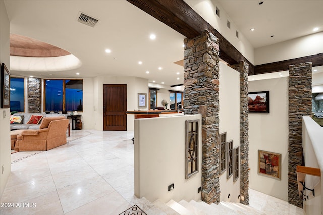 11070 E Rolling Rock Dr, Scottsdale, AZ 85262 - hallway with decorative columns, visible vents, recessed lighting, and light tile patterned floors