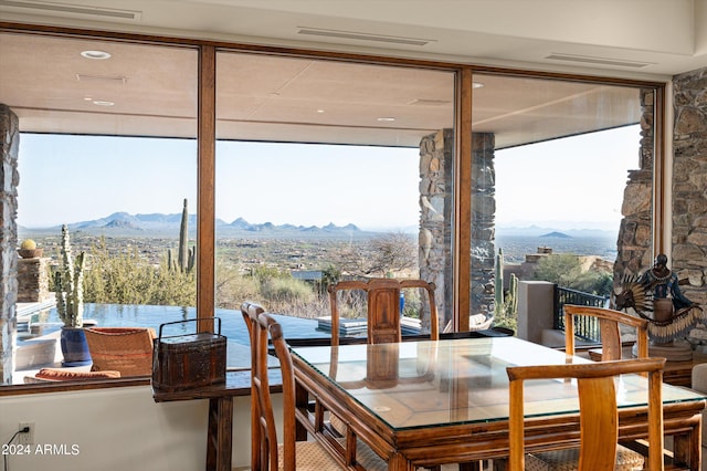 11070 E Rolling Rock Dr, Scottsdale, AZ 85262 - dining space featuring a mountain view and visible vents