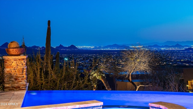 11070 E Rolling Rock Dr, Scottsdale, AZ 85262 - view of pool featuring a mountain view and a pool with connected hot tub