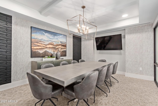 dining area featuring a raised ceiling, beam ceiling, and a notable chandelier