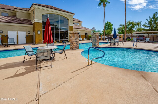 view of pool with a patio area