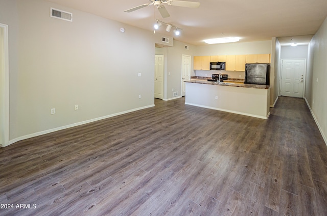 kitchen featuring ceiling fan, sink, black appliances, and dark hardwood / wood-style flooring