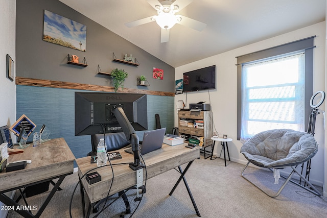 carpeted office featuring ceiling fan and lofted ceiling