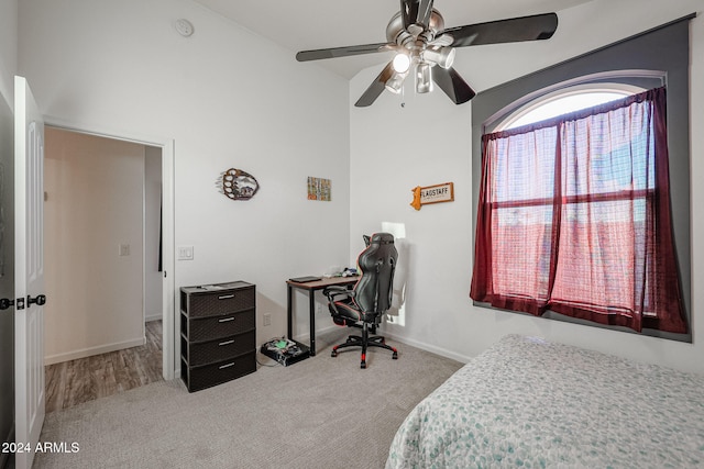 carpeted bedroom with ceiling fan