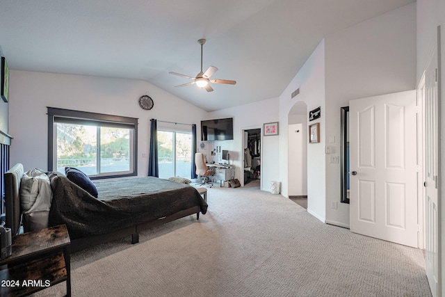 bedroom with light carpet, ceiling fan, and lofted ceiling