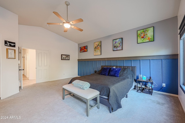 carpeted bedroom featuring ceiling fan and lofted ceiling