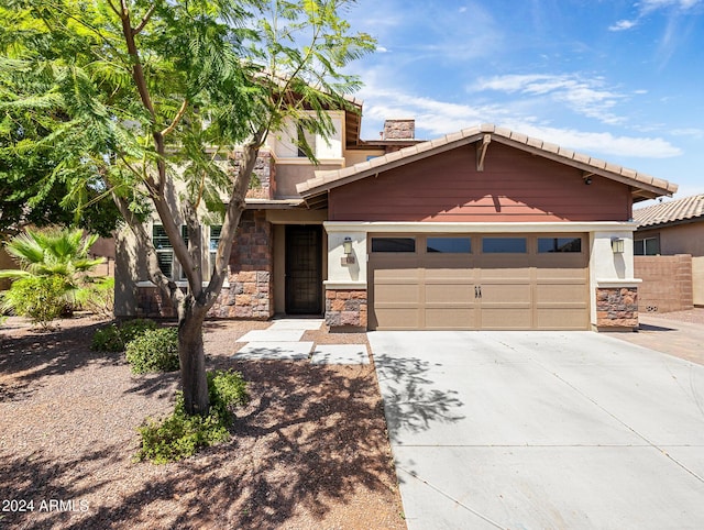 view of front of home with a garage