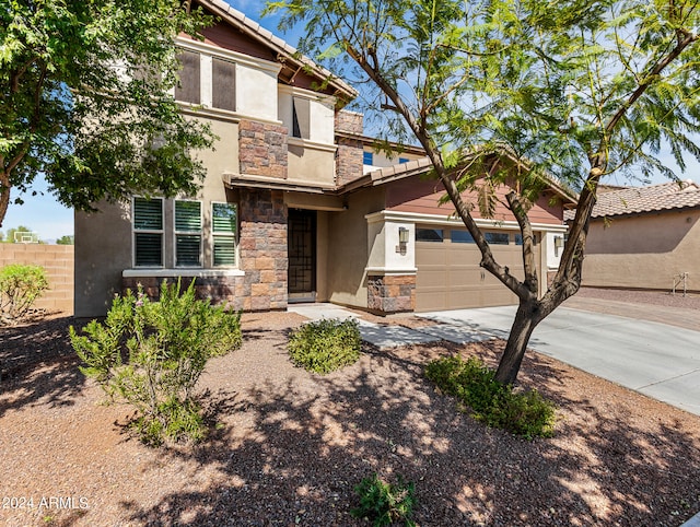 view of front of home with a garage