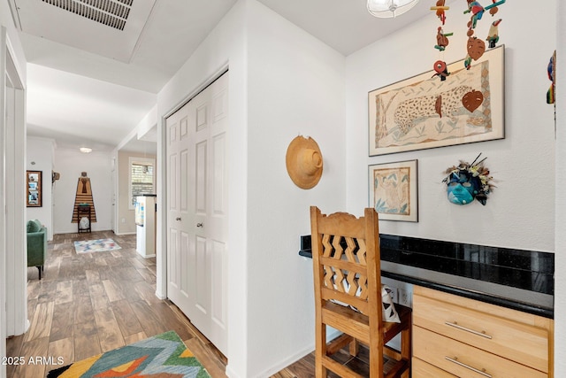 hall featuring wood-type flooring