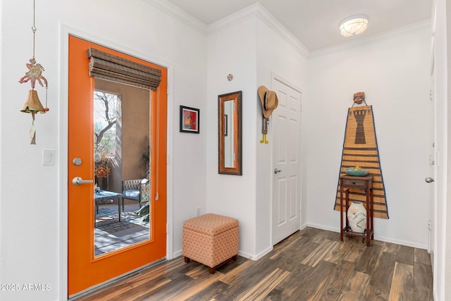 foyer featuring ornamental molding and dark hardwood / wood-style floors