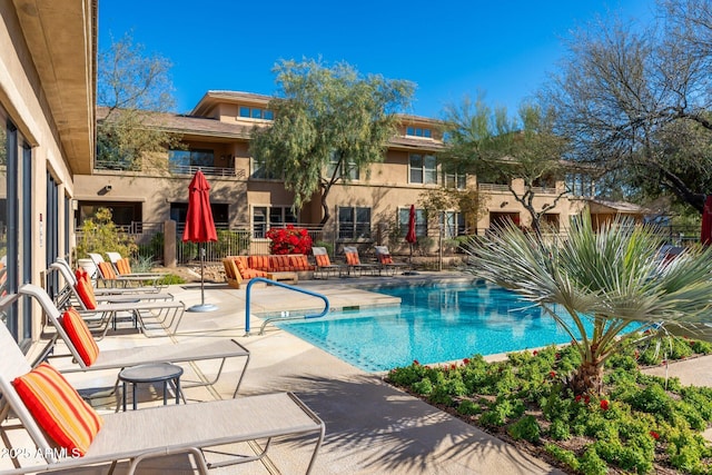 view of pool with a patio area