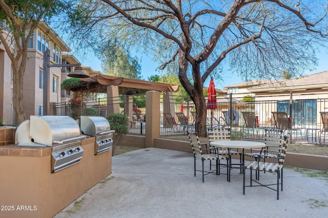 view of patio / terrace featuring an outdoor kitchen and area for grilling