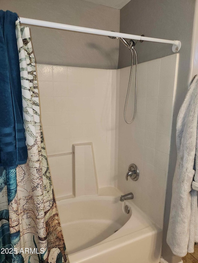 bathroom featuring shower / tub combo