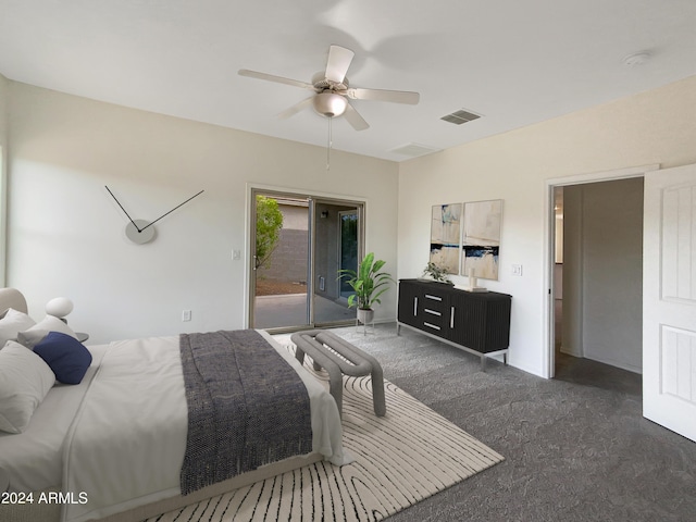 bedroom with access to outside, visible vents, dark carpet, and ceiling fan