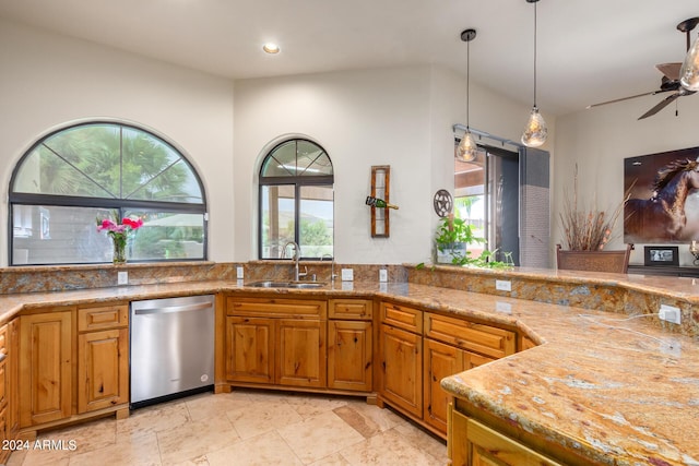 kitchen with dishwasher, decorative light fixtures, backsplash, ceiling fan, and sink