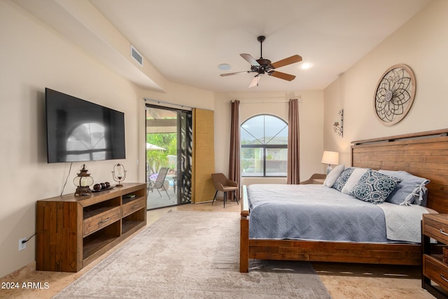 bedroom featuring ceiling fan and access to exterior