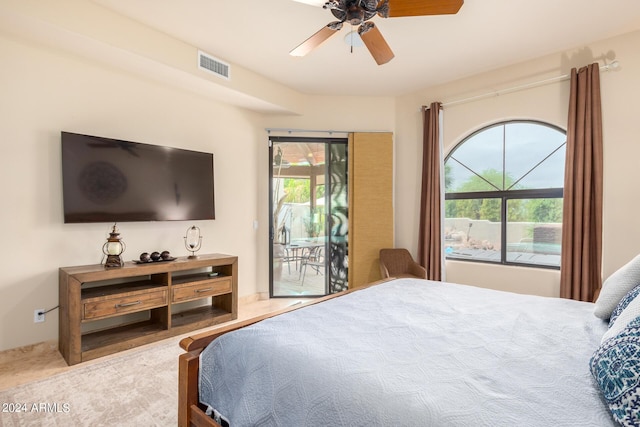 bedroom featuring access to outside and ceiling fan