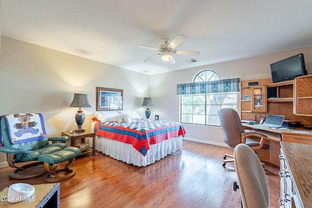 bedroom featuring ceiling fan and wood-type flooring