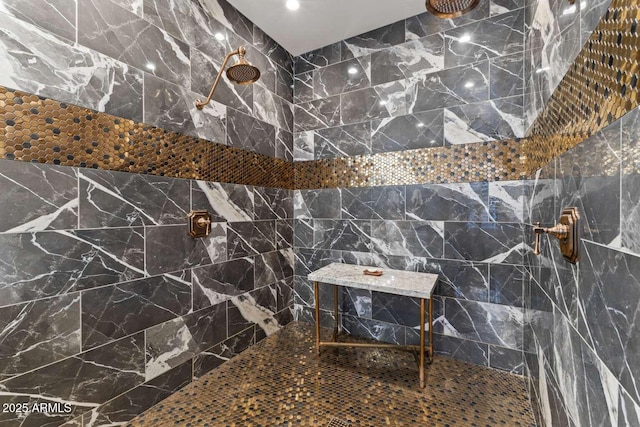 full bath with a tile shower