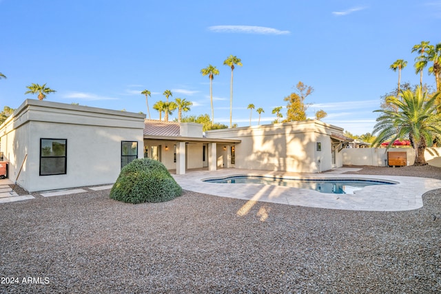 rear view of house featuring a patio area