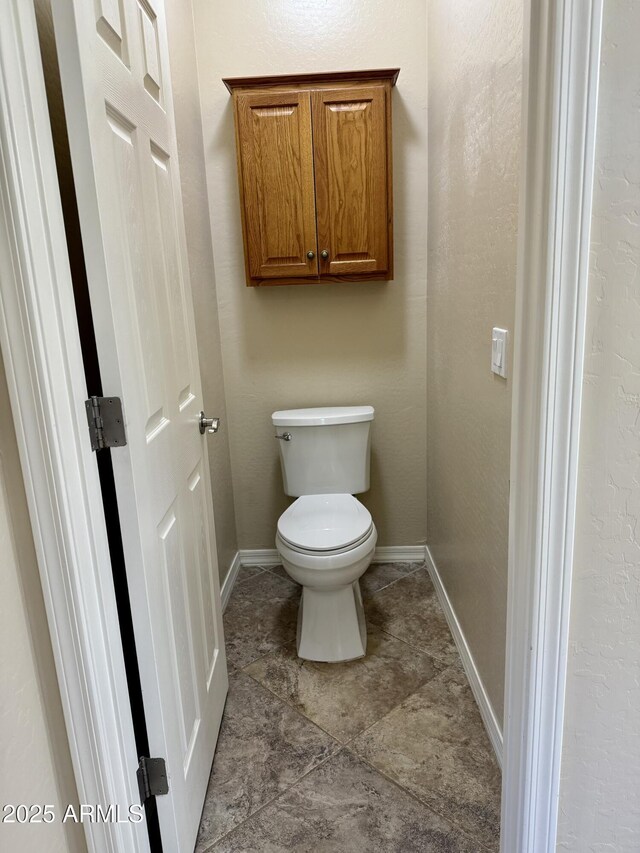 4117 W Allen St, Laveen, AZ 85339 - bathroom with toilet and baseboards