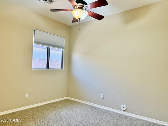 4117 W Allen St, Laveen, AZ 85339 - empty room featuring carpet flooring, baseboards, and ceiling fan