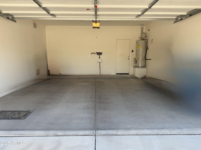 4117 W Allen St, Laveen, AZ 85339 - garage with water heater and a garage door opener