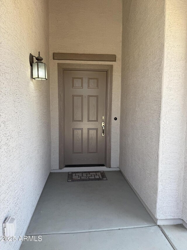 4117 W Allen St, Laveen, AZ 85339 - view of exterior entry featuring stucco siding