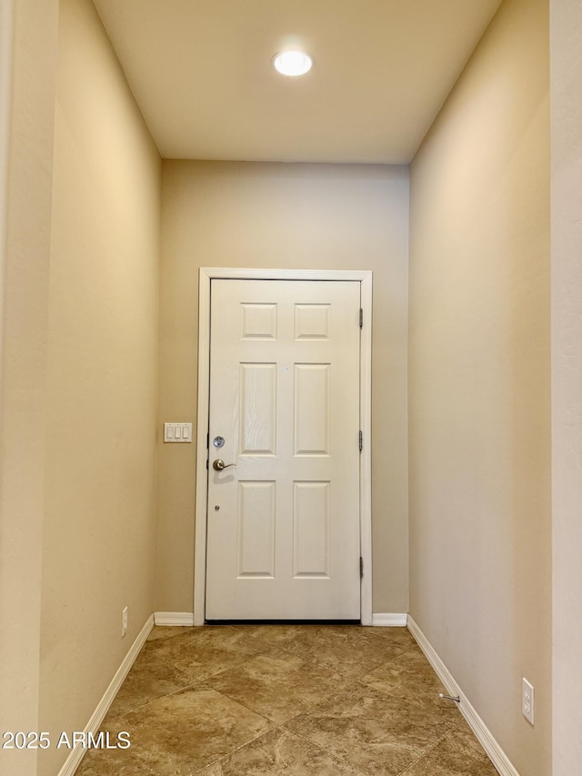 4117 W Allen St, Laveen, AZ 85339 - doorway to outside featuring baseboards and recessed lighting